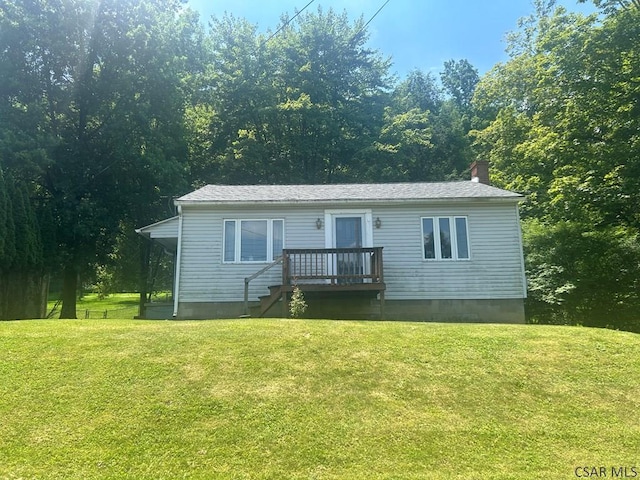 128 15th St, New Florence, PA 15944 - view of front of house with a front yard and a chimney