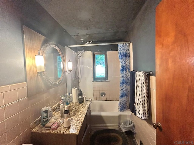 128 15th St, New Florence, PA 15944 - full bath featuring shower / bath combination with curtain, tile walls, and vanity