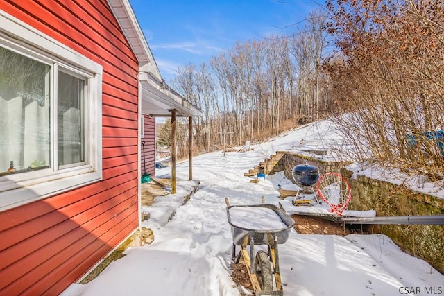 view of snow covered patio