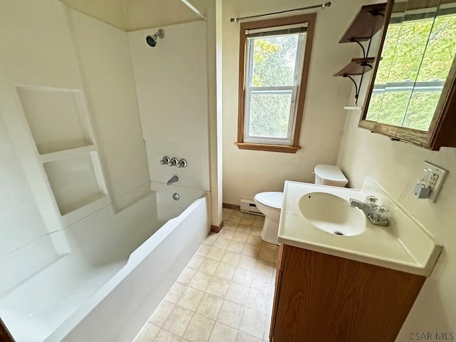 full bathroom featuring vanity, a baseboard heating unit, bathing tub / shower combination, and toilet