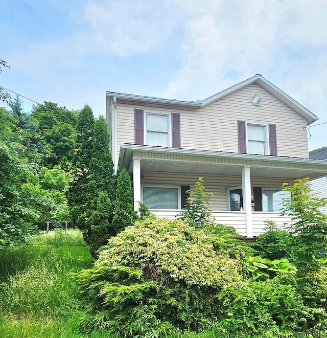 318 Vaughn St, Johnstown, PA 15906 - view of property exterior with a porch