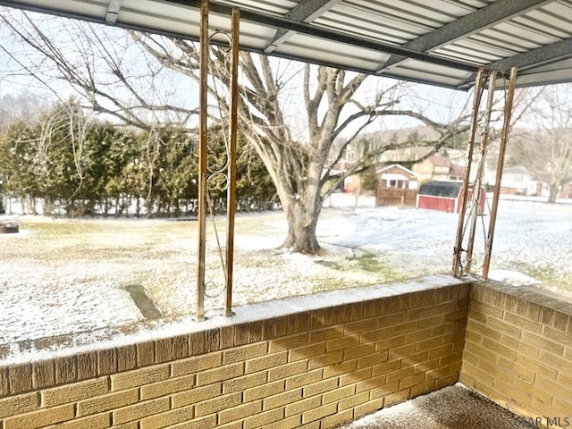 view of yard layered in snow