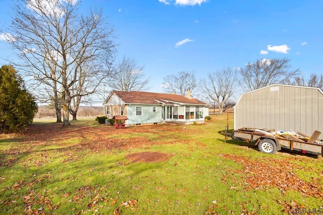 view of yard featuring a sunroom