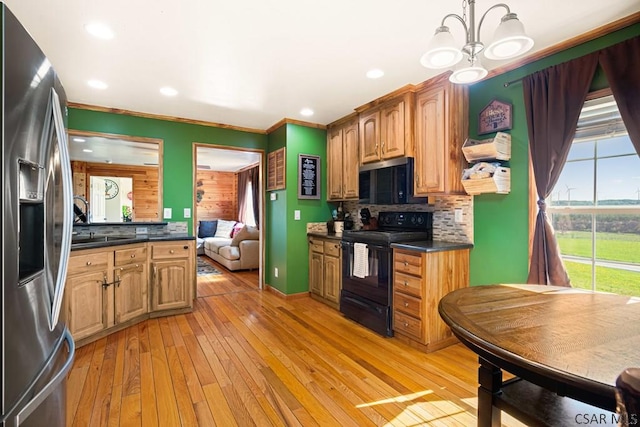 1070 Huckleberry Hwy, Central City, PA 15926 - kitchen featuring dark countertops, backsplash, electric range, and stainless steel refrigerator with ice dispenser