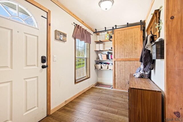 1070 Huckleberry Hwy, Central City, PA 15926 - entrance foyer with baseboards, ornamental molding, and hardwood / wood-style floors