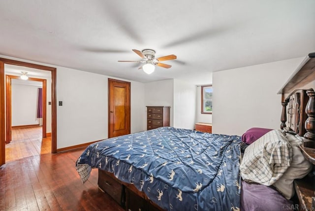 bedroom with ceiling fan and hardwood / wood-style floors