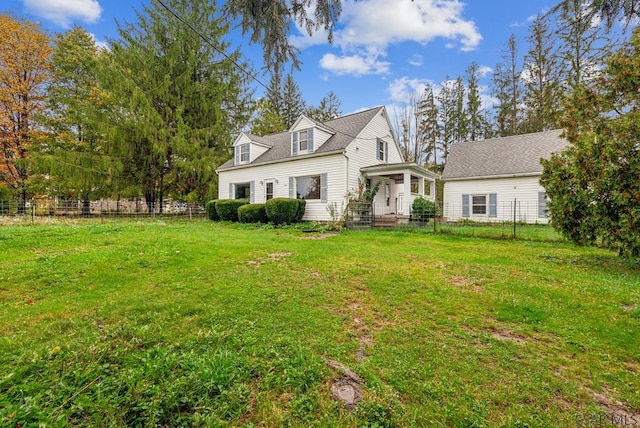 view of front of property with a front lawn