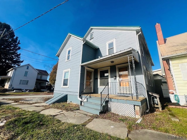 view of front of home featuring covered porch