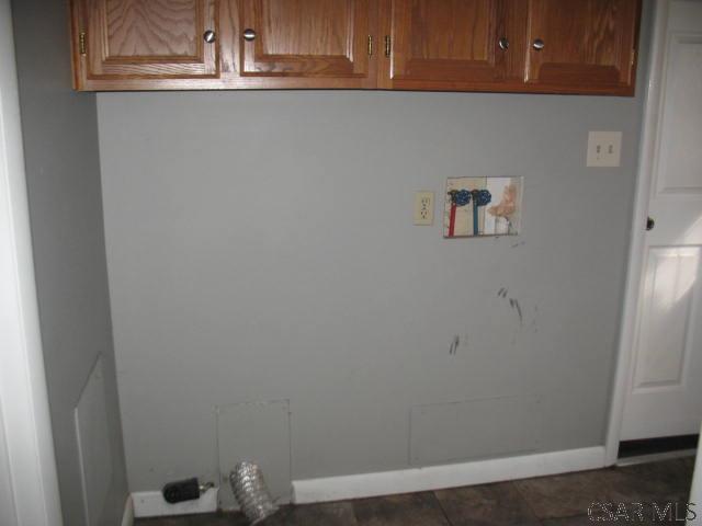 washroom featuring cabinets and hookup for a washing machine