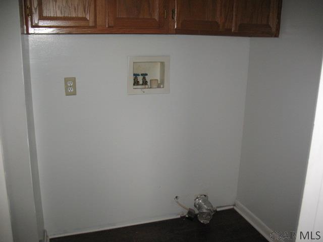 washroom featuring cabinets and hookup for a washing machine