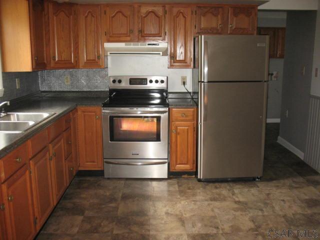 kitchen with sink and stainless steel appliances