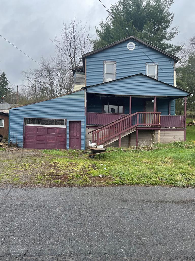 1011 Broadway St, Rockwood, PA 15557 - view of front facade with a detached garage