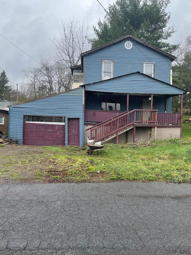 1011 Broadway St, Rockwood, PA 15557 - view of front facade with a detached garage