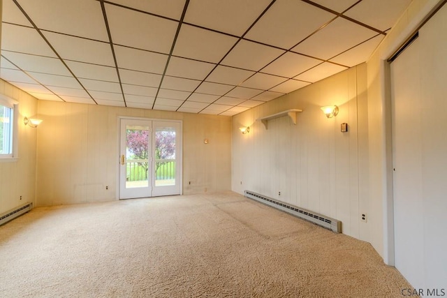1750 Scalp Ave, Johnstown, PA 15904 - carpeted empty room with baseboard heating and a paneled ceiling