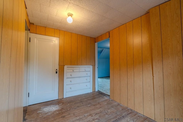 1750 Scalp Ave, Johnstown, PA 15904 - unfurnished bedroom with wood walls and wood finished floors
