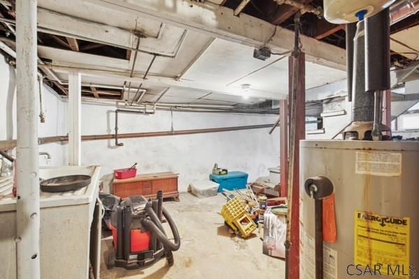 basement with sink and water heater