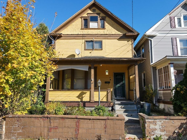 victorian home featuring a porch