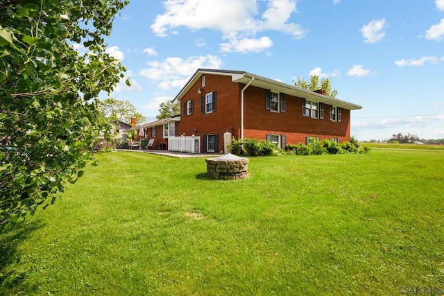 258 Samuels Rd, Somerset, PA 15501 - view of side of home with brick siding and a yard