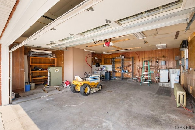 258 Samuels Rd, Somerset, PA 15501 - garage with a garage door opener and radiator