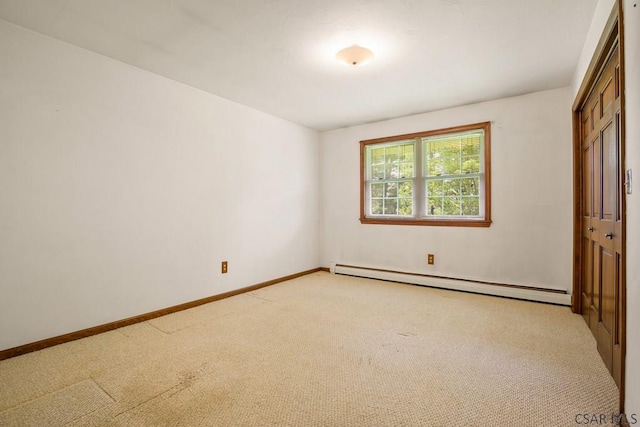 258 Samuels Rd, Somerset, PA 15501 - unfurnished bedroom with baseboard heating, light colored carpet, and a closet