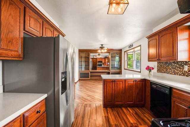 258 Samuels Rd, Somerset, PA 15501 - kitchen with stainless steel fridge, dishwasher, dark wood-style flooring, and light countertops