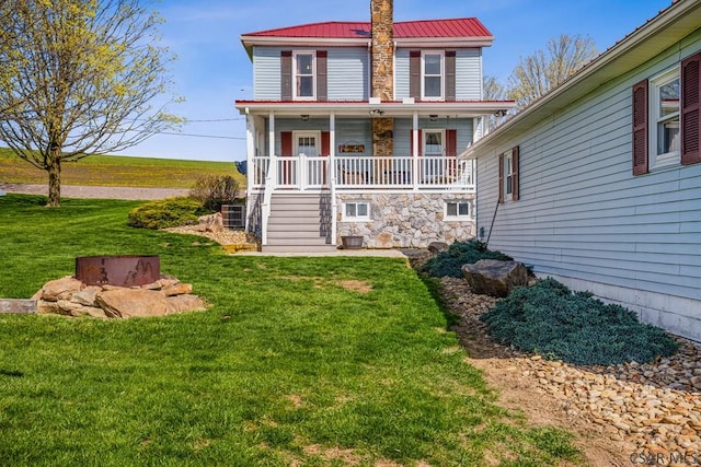 1139 Chickentown Rd, Somerset, PA 15501 - back of house featuring a porch, a yard, and metal roof