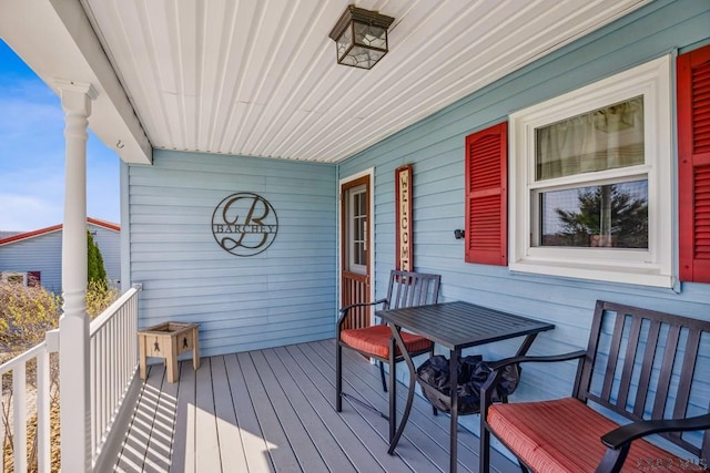 1139 Chickentown Rd, Somerset, PA 15501 - deck with outdoor dining space and covered porch