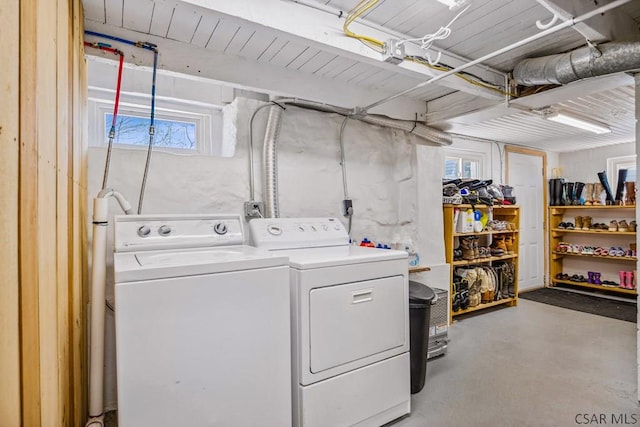 1139 Chickentown Rd, Somerset, PA 15501 - clothes washing area featuring washer and clothes dryer, a wealth of natural light, and laundry area
