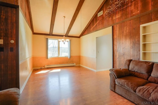 living room with lofted ceiling with beams, built in features, wood finished floors, a baseboard radiator, and a chandelier