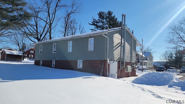 view of snow covered property