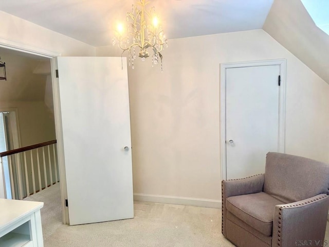 living area featuring lofted ceiling, light colored carpet, and a chandelier