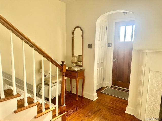 entryway featuring dark wood-type flooring