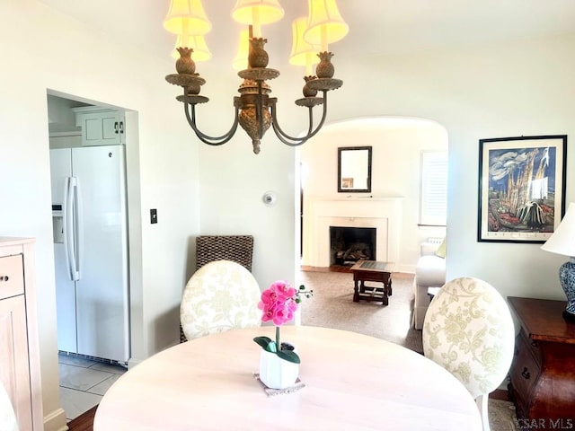 dining area with a notable chandelier