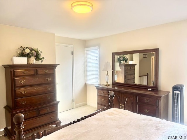 bedroom with light carpet