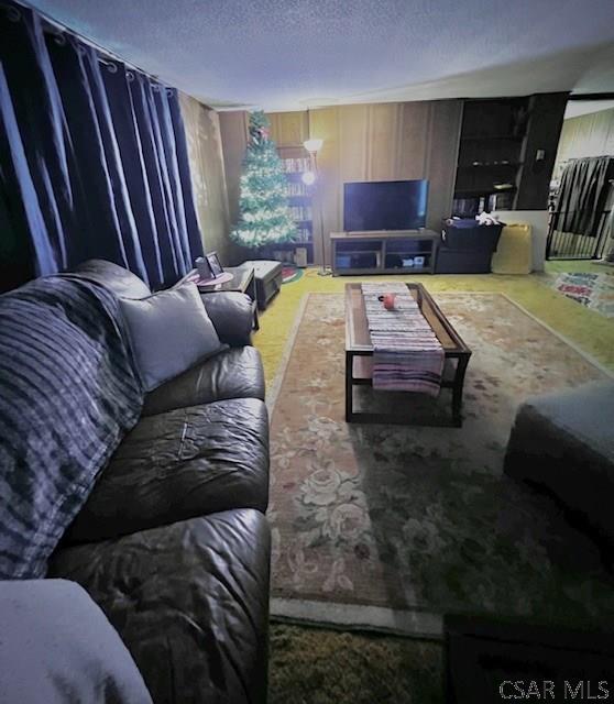 520 Highland Ave, Connellsville, PA 15425 - living room featuring a textured ceiling