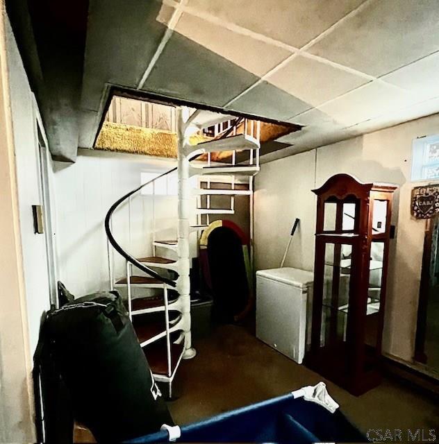 520 Highland Ave, Connellsville, PA 15425 - basement with fridge and a paneled ceiling