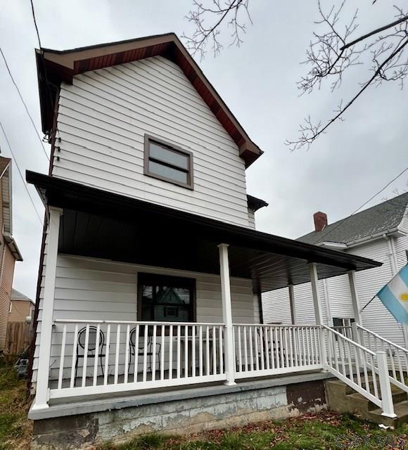 520 Highland Ave, Connellsville, PA 15425 - rear view of property with covered porch