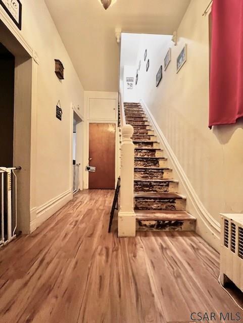 520 Highland Ave, Connellsville, PA 15425 - staircase with wood-type flooring