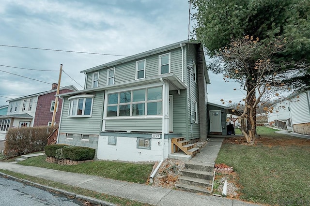 view of front of house with a front yard