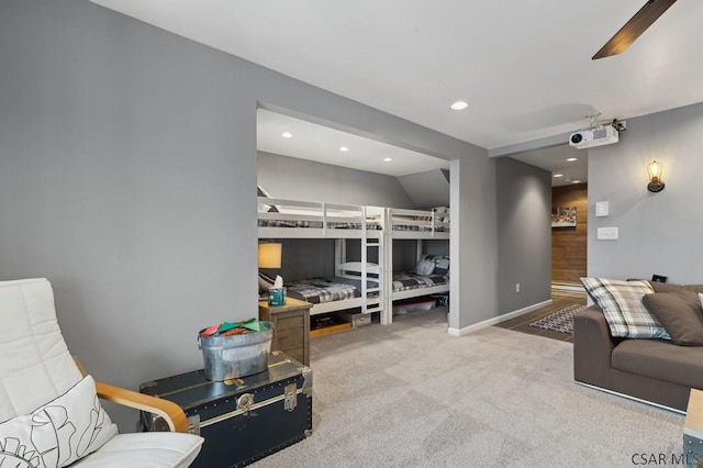 carpeted bedroom featuring a ceiling fan, recessed lighting, and baseboards