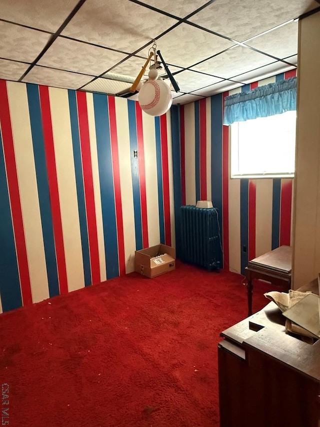 604-606 Grove Ave, Johnstown, PA 15902 - interior space featuring wallpapered walls, radiator heating unit, carpet, and a drop ceiling