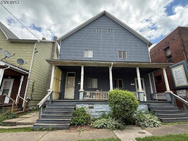 604-606 Grove Ave, Johnstown, PA 15902 - view of front of house featuring covered porch and stairway