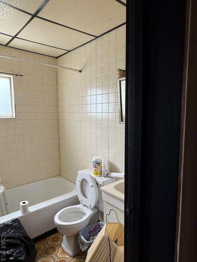 604-606 Grove Ave, Johnstown, PA 15902 - bathroom featuring tile walls, tub / shower combination, toilet, and vanity