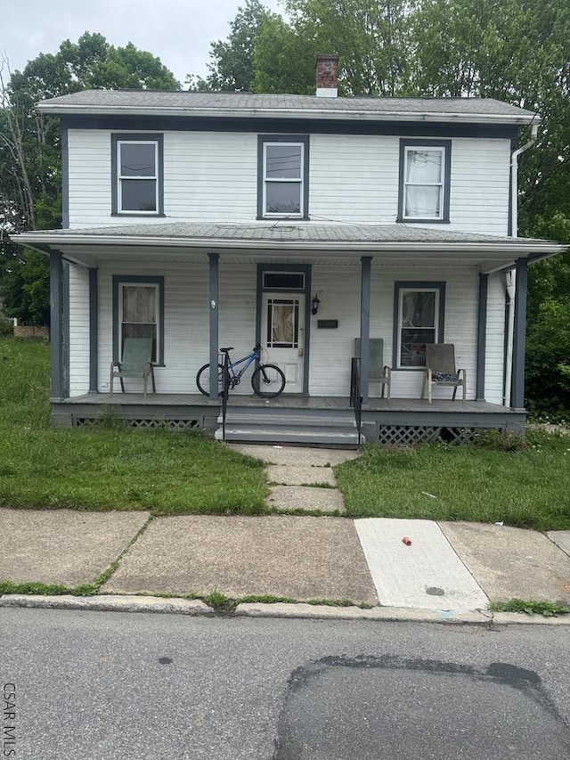 113 Sheridan St, Johnstown, PA 15906 - view of front of property with a porch and a chimney