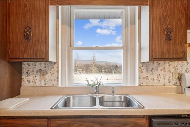 kitchen featuring sink and dishwasher