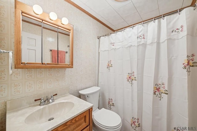 bathroom featuring ornamental molding, vanity, toilet, and a shower with shower curtain