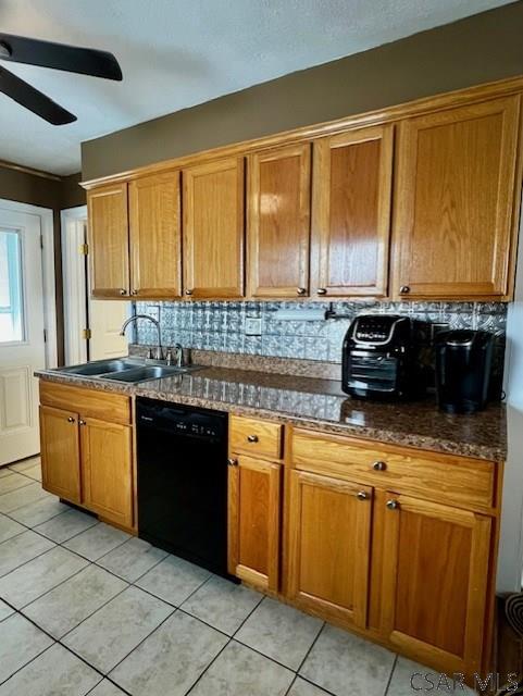 kitchen with dishwasher, sink, decorative backsplash, light tile patterned floors, and ceiling fan