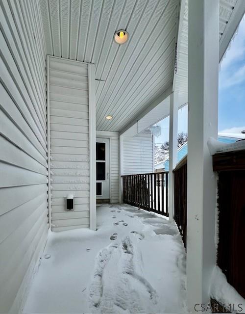 view of snow covered patio