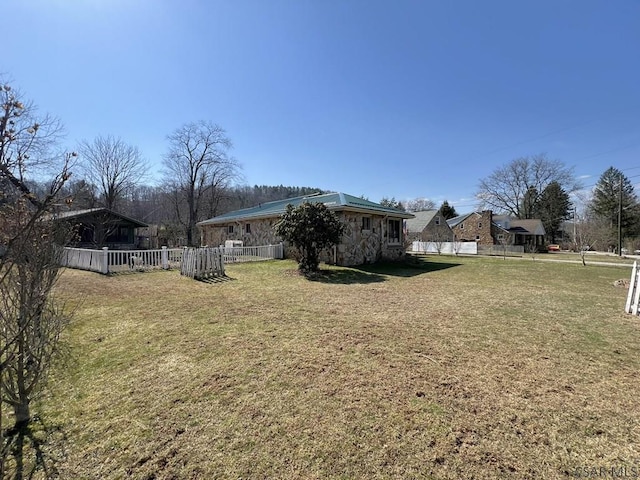 view of yard with fence