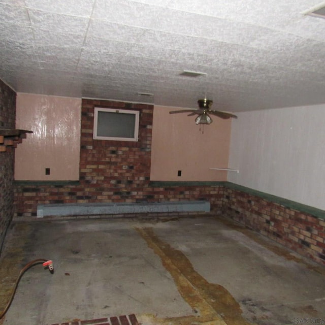 313 Dalton Run Rd, Johnstown, PA 15905 - below grade area featuring brick wall and a ceiling fan